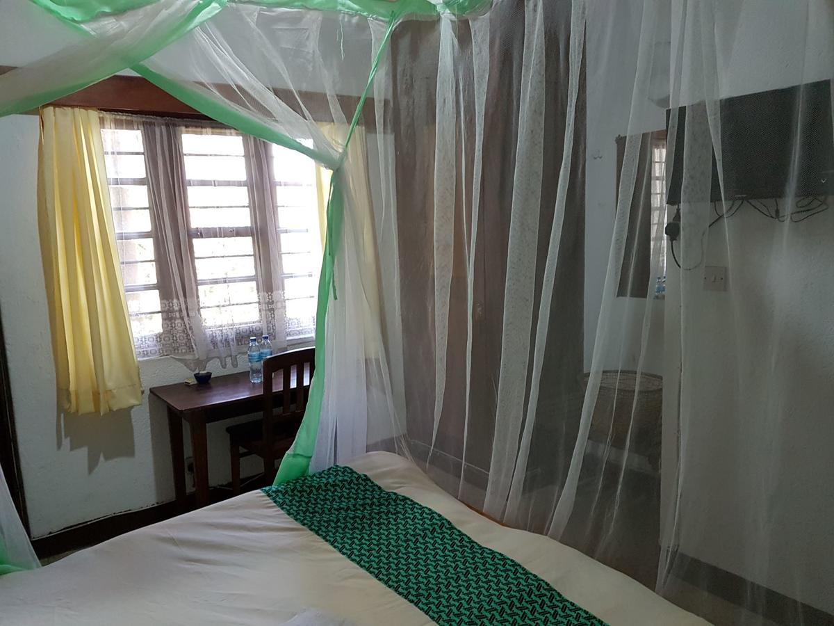 Karibuni Center Hotel อึมเบยา ภายนอก รูปภาพ