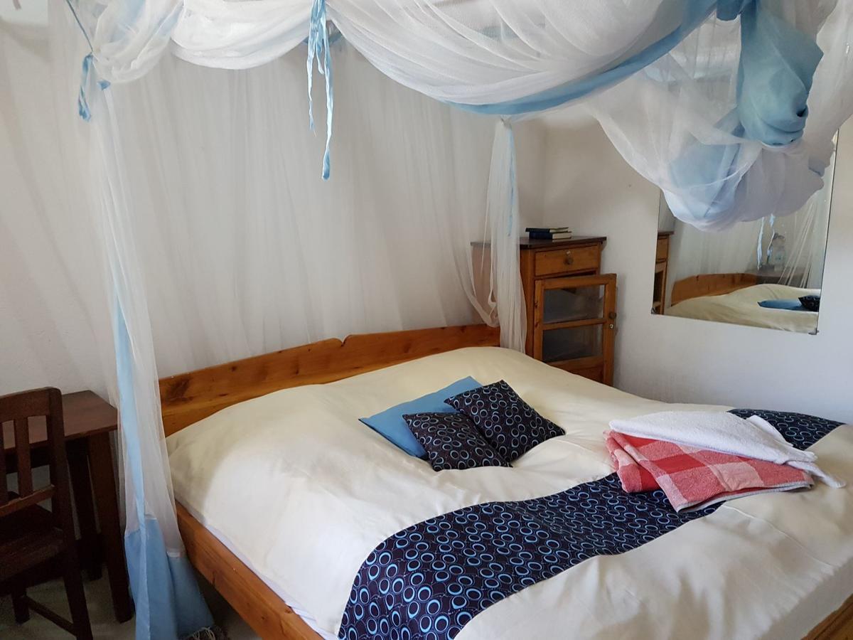 Karibuni Center Hotel อึมเบยา ภายนอก รูปภาพ